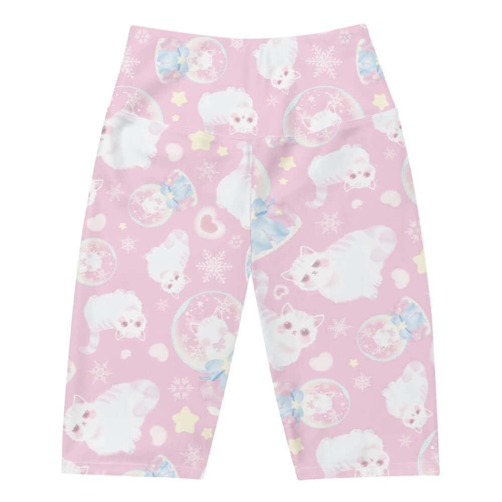 Snow Kitten Biker Shorts feature adorable fluffy kittens on a pink background, perfect for your kawaii workout style.