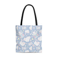 Cute and stylish Snow Kitten Tote Bag (Blue) perfect for the beach or town, featuring durable black handles.