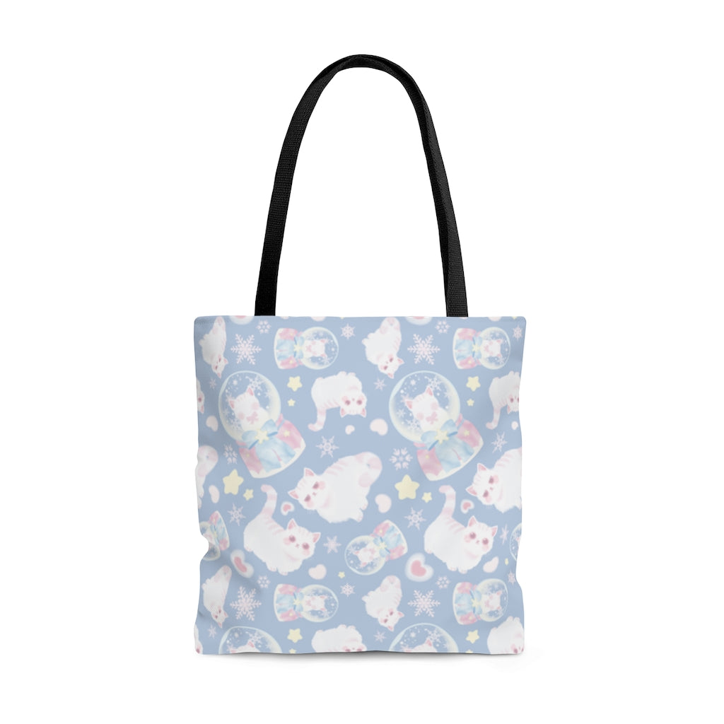 Cute and stylish Snow Kitten Tote Bag (Blue) perfect for the beach or town, featuring durable black handles.