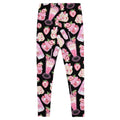 Colorful strawberry leggings featuring playful prints of strawberries and smoothies on a dark background.