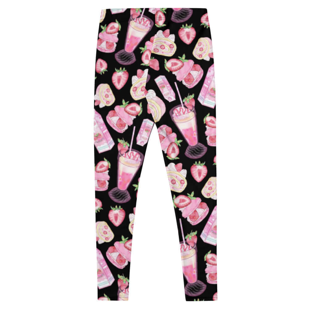 Colorful strawberry leggings featuring playful prints of strawberries and smoothies on a dark background.