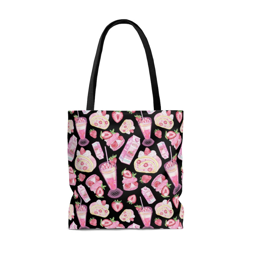 Stylish Strawberry Tote Bag (Black) features vibrant designs and durable cotton straps for all your adventures.