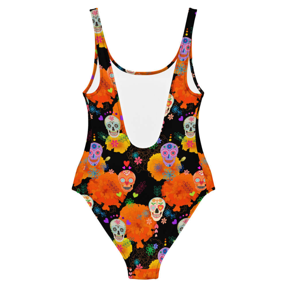 Vibrant Sugar Skull One-Piece Swimsuit with colorful patterns, perfect for fun days in the sun.