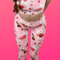 Sugar Sweetheart Leggings offer a cozy fit with a playful design, perfect for Valentine's Day style and comfort.