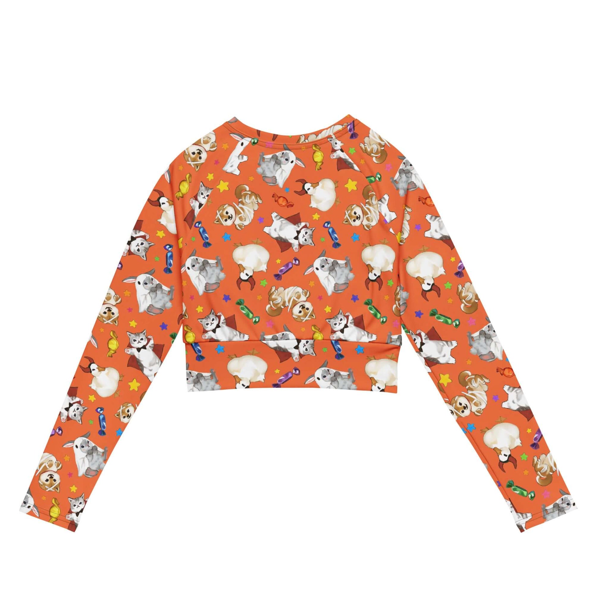 Bright orange Trick or Treaters Long-sleeved Crop Top featuring playful dog designs, perfect for eco-friendly athleisure.