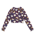 Eco-friendly Trick or Treaters Long-sleeved Crop Top features a playful design, perfect for athleisure or casual wear.
